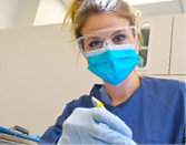 An FSC Dental Hygiene student