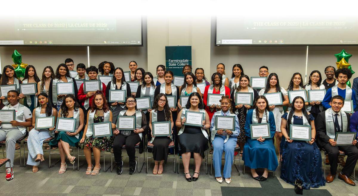 Group of students with certificates
