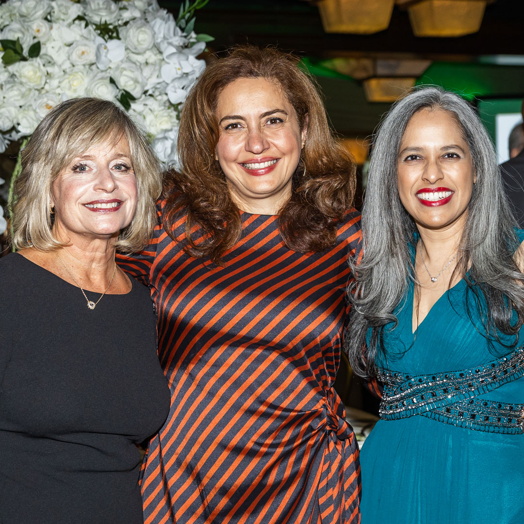 Dr. Laura Joseph with faculty and staff members at the president's gala, 2024.