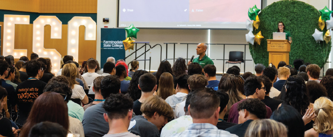 New student orientation crowd listening to a speaker